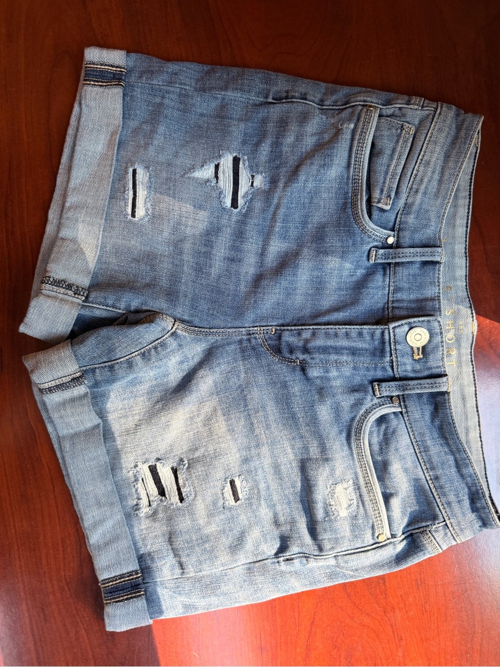 Light Wash Distressed Denim Shorts - Women's